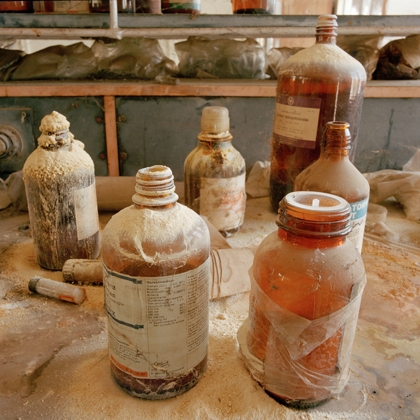 In Union Carbide’s laboratory, bottles of reagents are abandoned. Photo by Andy Moxom